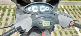     Piaggio X9   Honda 