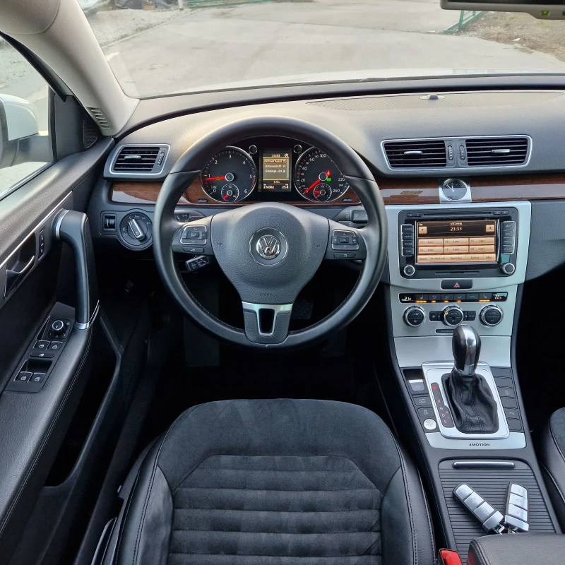 VW Passat 2.0 TDi 4Х4 ДИСТРОНИК КЕЙЛЕС ШВЕЙЦАРИЯ , снимка 14 - Автомобили и джипове - 48716480