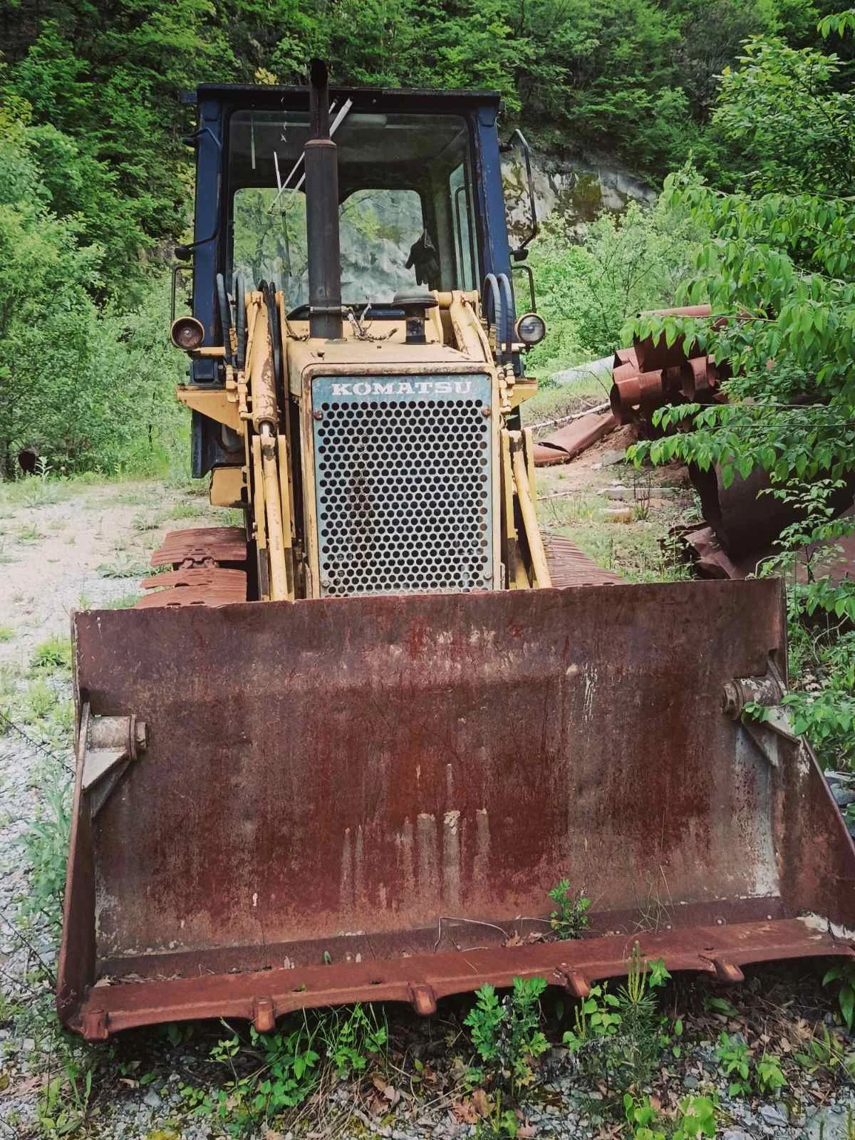 Багер Komatsu D31S18
