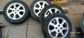    185/60R15  Opel Astra | Mobile.bg    2