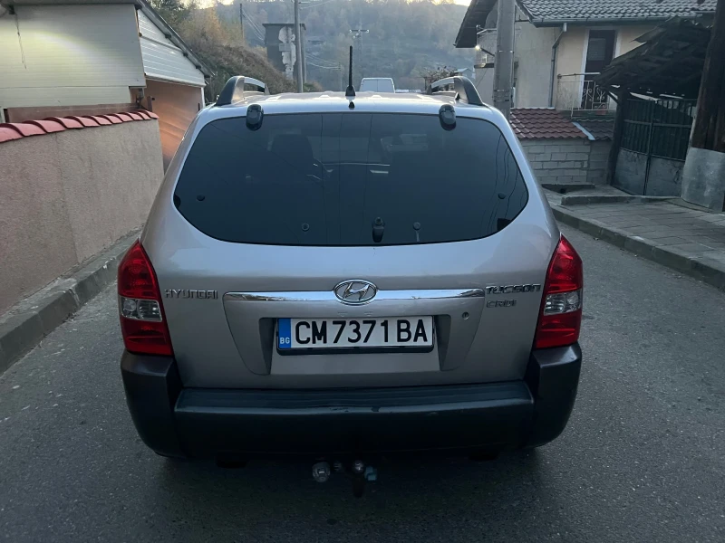 Hyundai Tucson 2.0 4x4 автомат, снимка 6 - Автомобили и джипове - 47828629