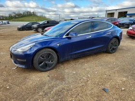 ������ Tesla Model 3