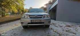 Mazda Tribute 4х4, снимка 10