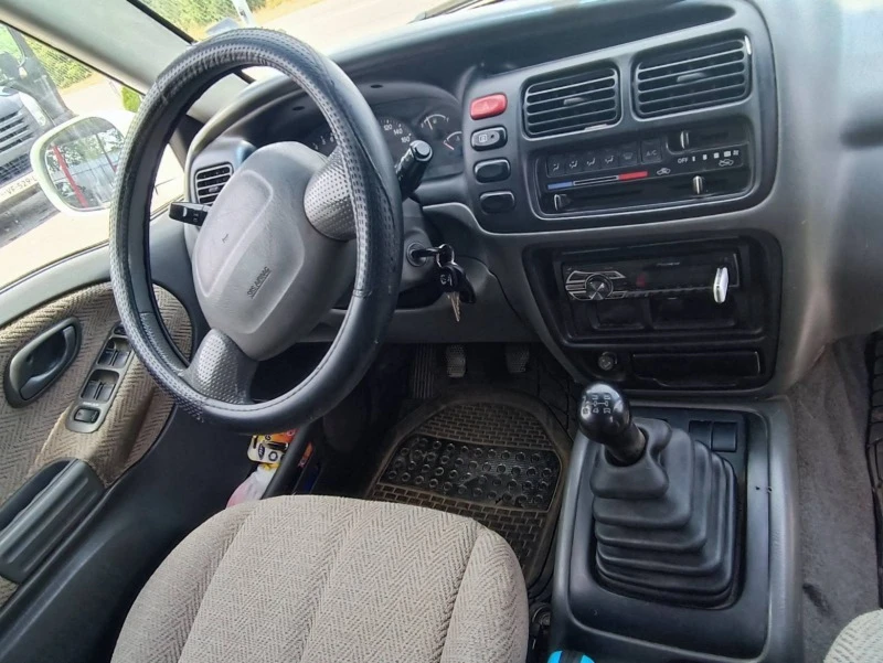 Suzuki Grand vitara, снимка 8 - Автомобили и джипове - 46473046