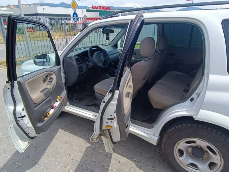 Suzuki Grand vitara, снимка 11 - Автомобили и джипове - 46473046