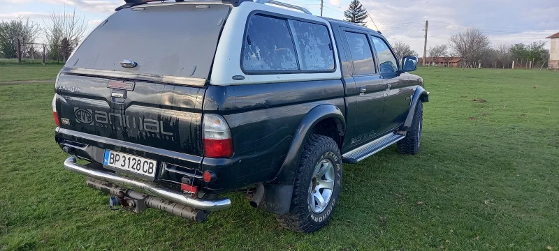 Mitsubishi L200, снимка 4 - Автомобили и джипове - 52843788