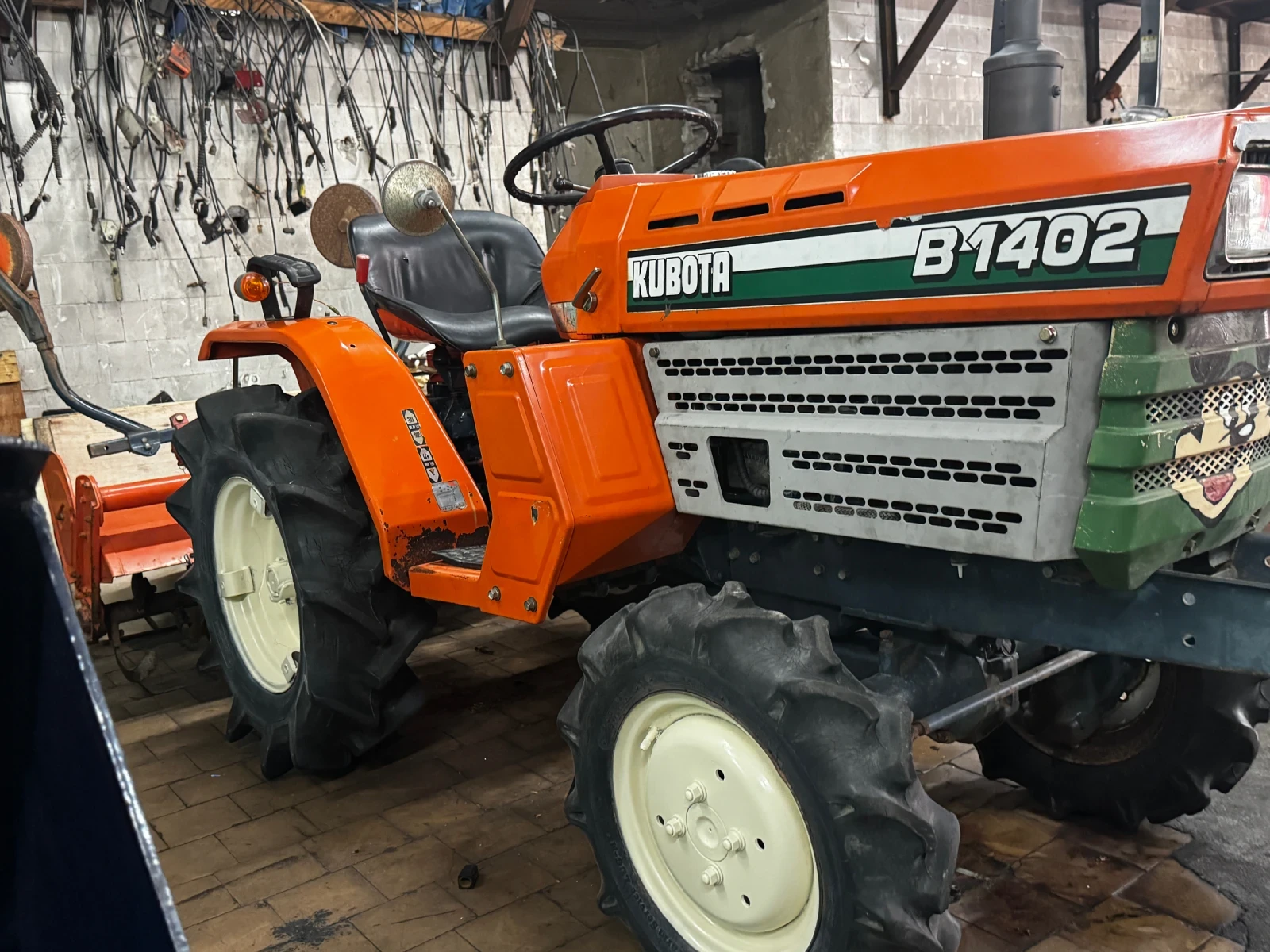 Трактор Kubota 1402