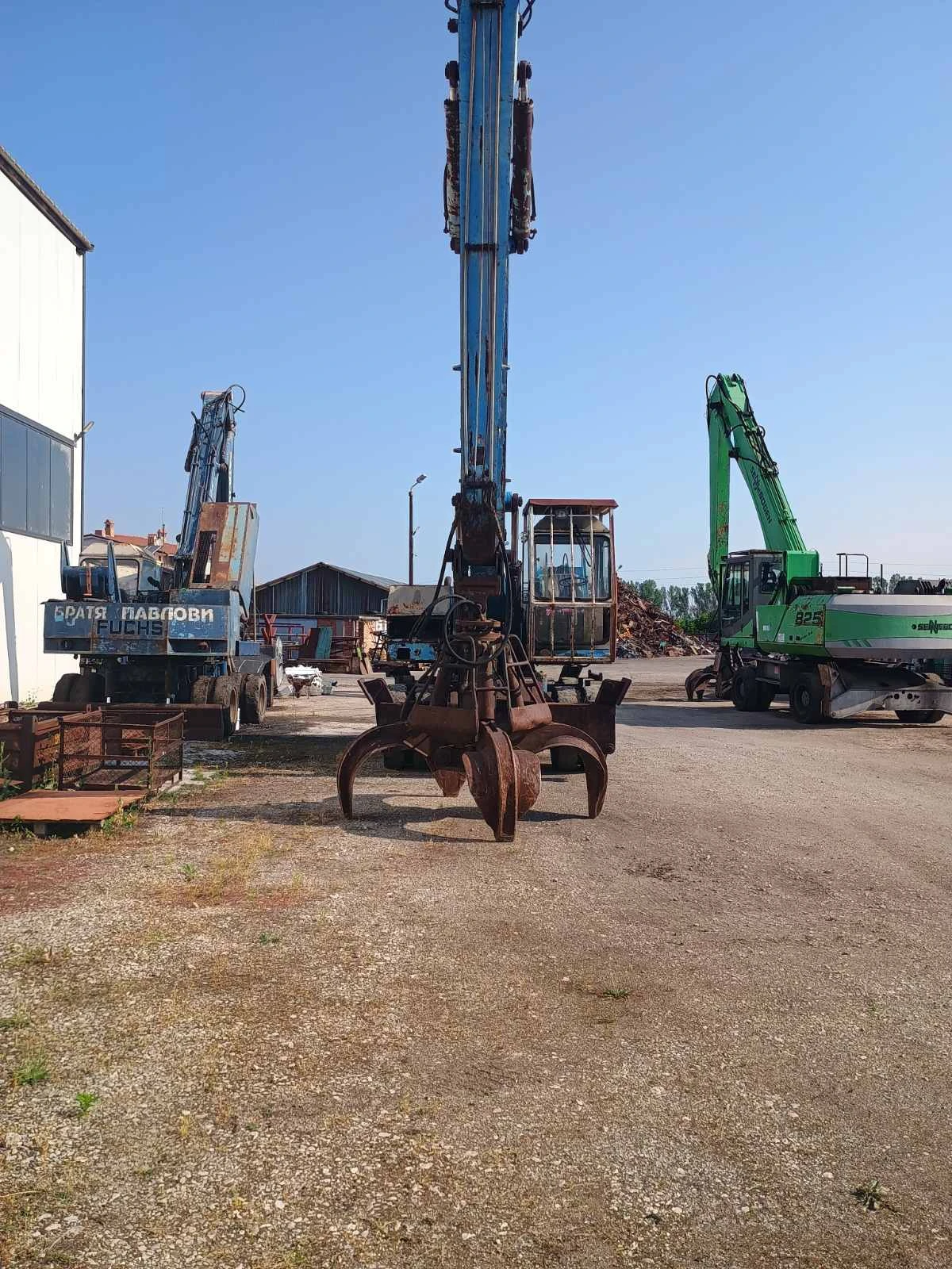 Багер Fuchs F714 - изображение 9