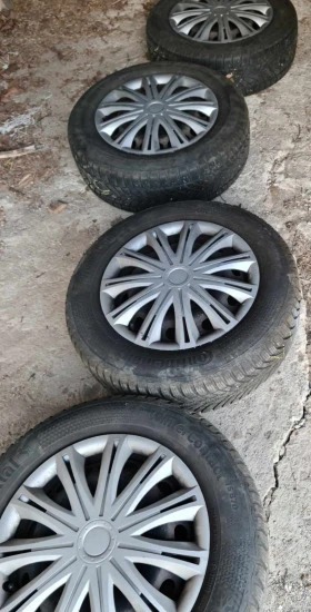 Гуми с джанти Continental 195/65R15, снимка 1 - Гуми и джанти - 49599842