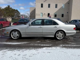 Mercedes-Benz E 55 AMG ПОДГРЕВИ * ПАМЕТ * ШИБИДАХ * CARFAX *  - 11500 € / 22492.04 лв. - 39419292 4