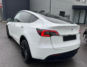 Tesla Model Y 2024 Long Range с Гаранция - 17900 € / 35009.36 лв. - 40514428 3