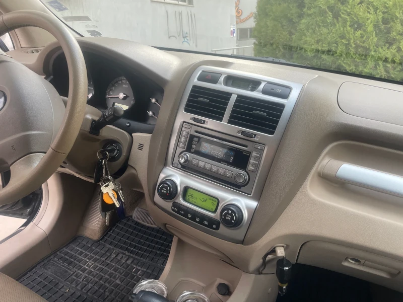 Kia Sportage 2.7 V6, снимка 9 - Автомобили и джипове - 53330880