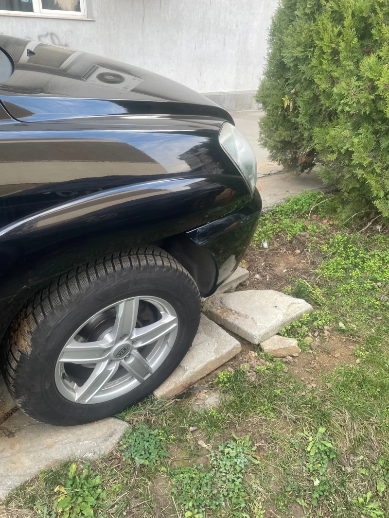 Kia Sportage 2.7 V6, снимка 4 - Автомобили и джипове - 53330880