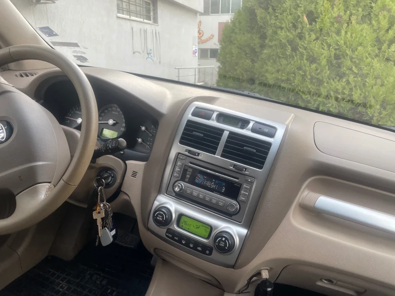 Kia Sportage 2.7 V6, снимка 7 - Автомобили и джипове - 53330880