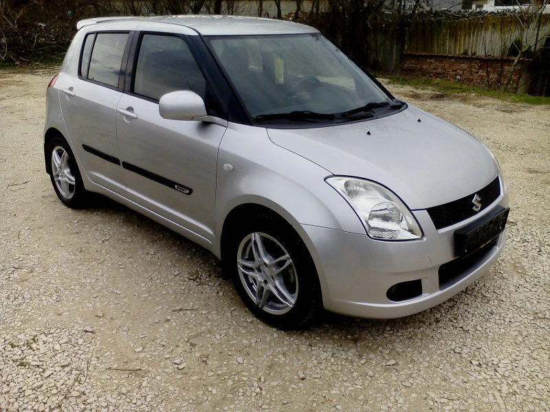 Suzuki Swift 4х4 1.3 i  92 Hp, снимка 7 - Автомобили и джипове - 38044251