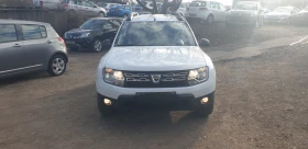     Dacia Duster 1.6i -   