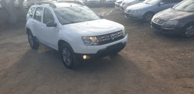     Dacia Duster 1.6i -   