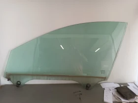 Стъкло предно ляво рено лагуна 2.0 б 