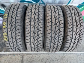 Гуми Зимни 205/70R15, снимка 1 - Гуми и джанти - 48122555