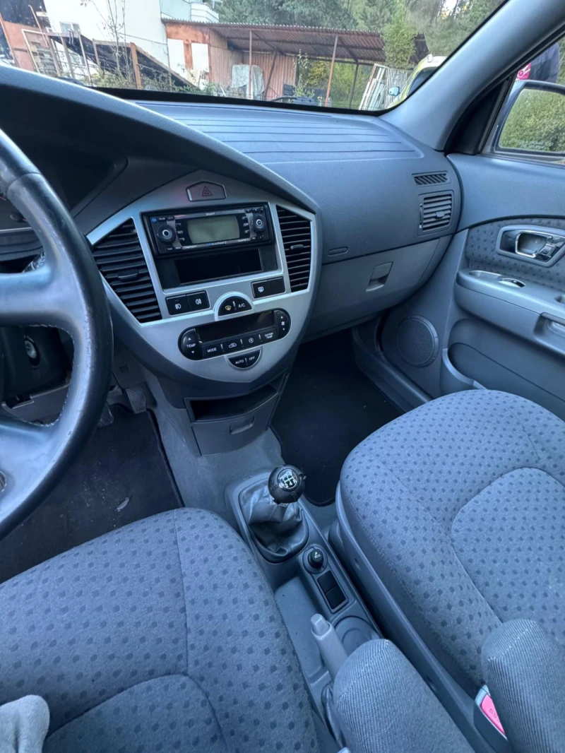 Kia Carens 2.0 Промоция , снимка 14 - Автомобили и джипове - 47681441