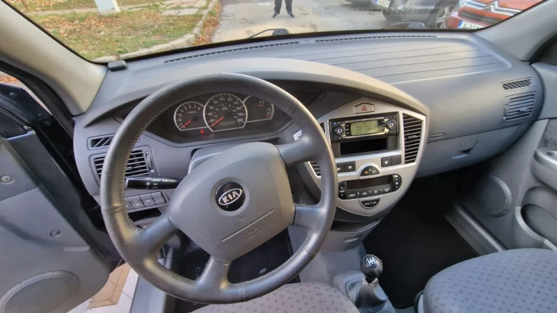 Kia Carens 2.0 Промоция , снимка 11 - Автомобили и джипове - 52848979