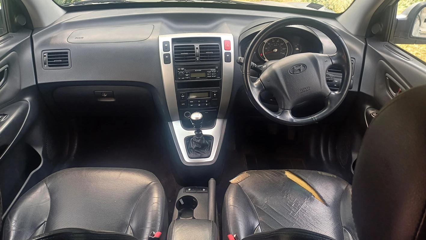 Hyundai Tucson 2, 0 CRDI 4×4 - изображение 7