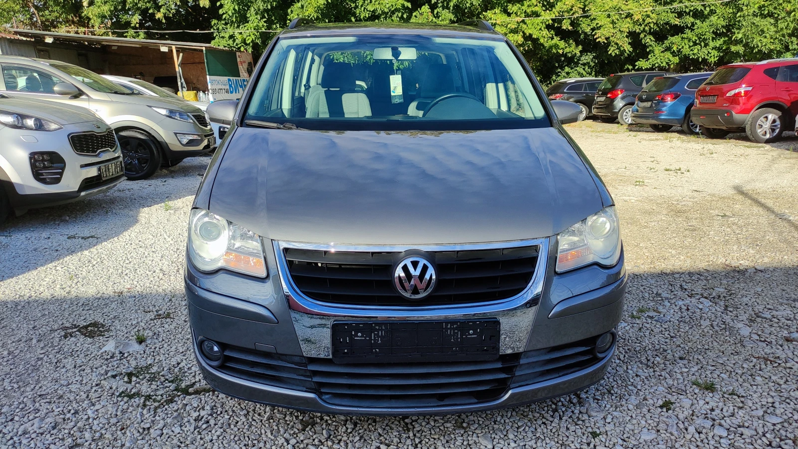 VW Touran 1.9 TDI DSG BLS FACELIFT, снимка 16 - Автомобили и джипове - 55714663
