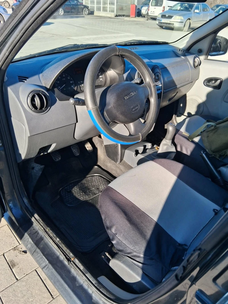 Dacia Logan, снимка 9 - Автомобили и джипове - 53472301