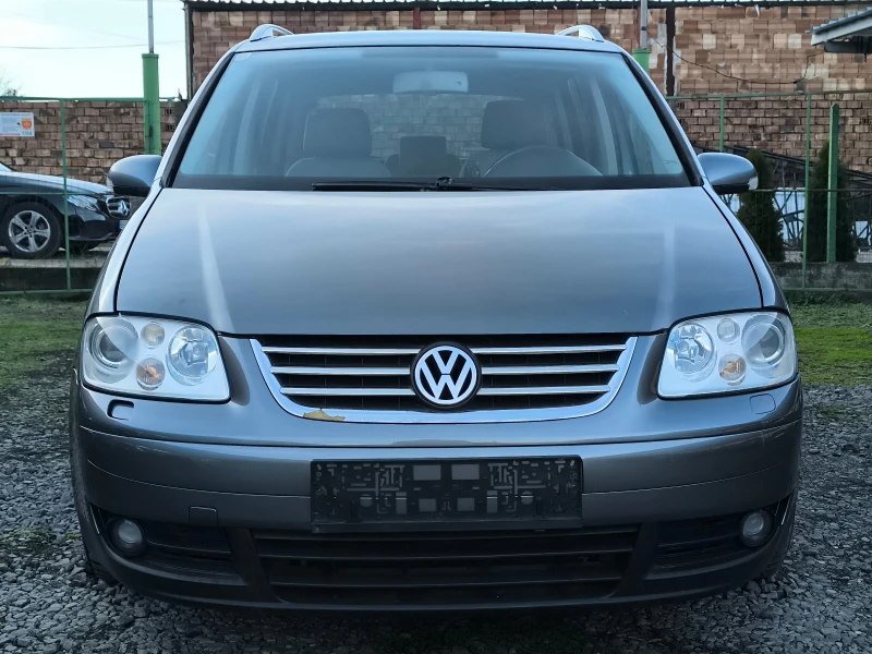 VW Touran 2.0TDI-140кс-6 скорости-7места-НАВИ-КЛИМА-КСЕНОН-, снимка 8 - Автомобили и джипове - 52727225
