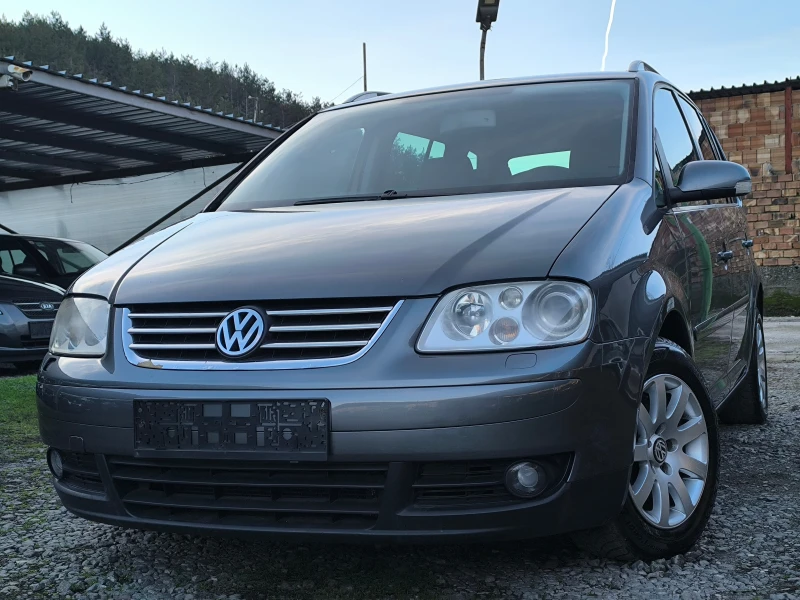 VW Touran 2.0TDI-140кс-6 скорости-7места-НАВИ-КЛИМА-КСЕНОН-, снимка 7 - Автомобили и джипове - 52727225