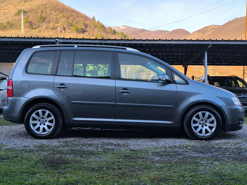 VW Touran 2.0TDI-140кс-6 скорости-7места-НАВИ-КЛИМА-КСЕНОН-, снимка 2 - Автомобили и джипове - 52727225