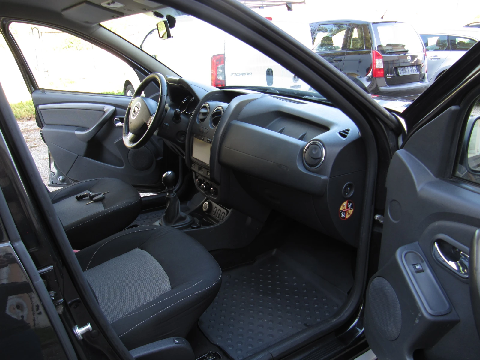 Dacia Duster 1.5dci 4X4 NAVI, снимка 11 - Автомобили и джипове - 54316097