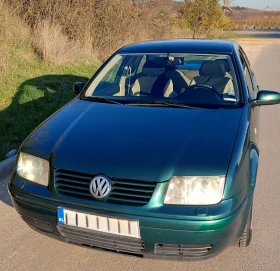 VW Bora 1.6, 101, SR, бензин + газ - изображение 1