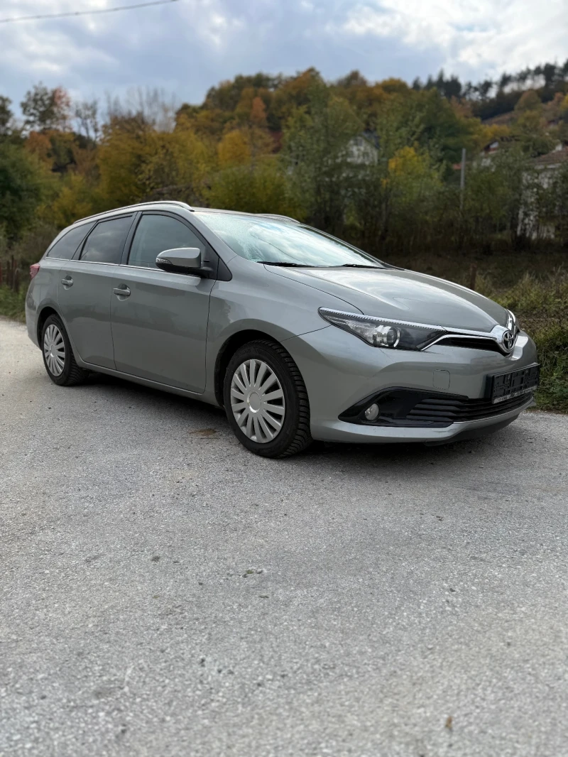 Toyota Auris Touringsport 1.6 D4-D Facelift, снимка 7 - Автомобили и джипове - 49686044