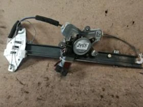 Стъклоповдигач преден десен Ssangyong Rexton 2003-2008 , снимка 1