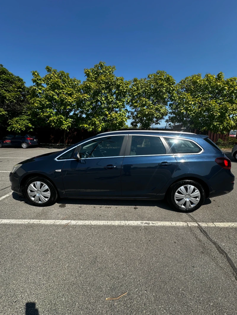Opel Astra Sports Tourer, снимка 7 - Автомобили и джипове - 51442440
