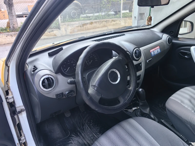 Dacia Logan, снимка 8 - Автомобили и джипове - 52314203