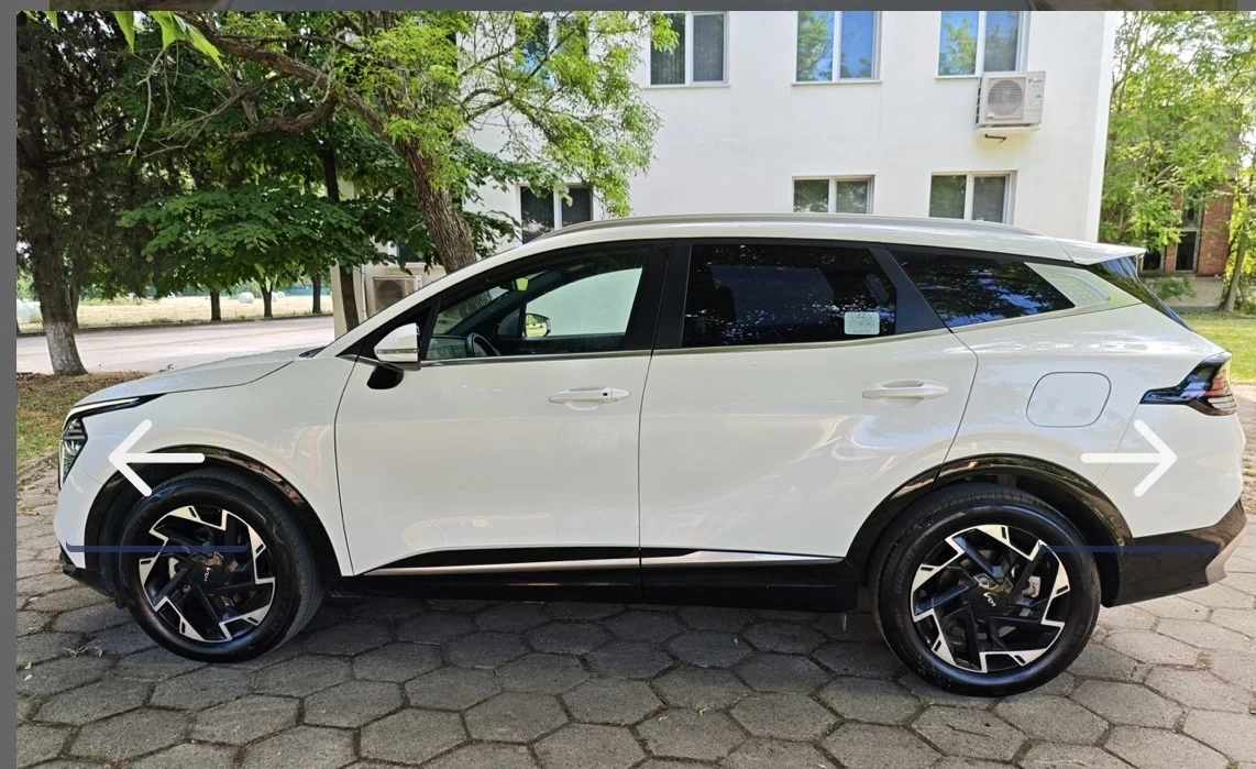 Kia Sportage 2.0 crdi, снимка 12 - Автомобили и джипове - 56607078