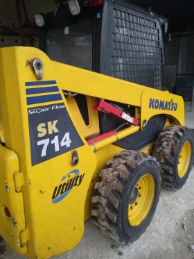 Мини челни товарачи Komatsu 714, снимка 1