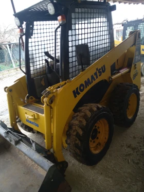 Мини челни товарачи Komatsu 714, снимка 2