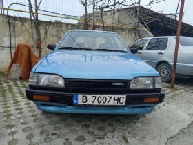 Обява за продажба на Mazda 323 1.3 ~9 000 лв. - изображение 1