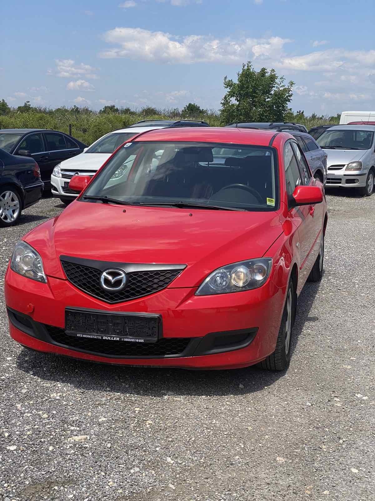 Mazda 3 1.4те - изображение 1