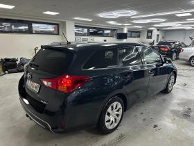 Toyota Auris 1.4D4d 90к.с Обслужена* Всичко платено, снимка 2