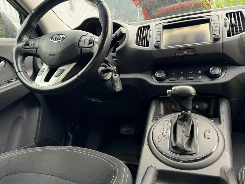 Kia Sportage 2.0 CRDI, снимка 8 - Автомобили и джипове - 47577828