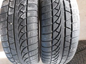 Гуми Зимни 215/65R15, снимка 2 - Гуми и джанти - 44397100