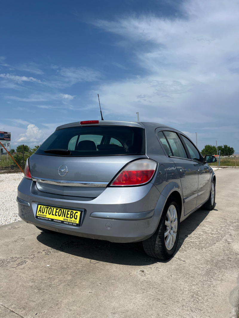 Opel Astra 1.6 twinport, снимка 4 - Автомобили и джипове - 46021100