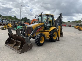 Багер Volvo BL71