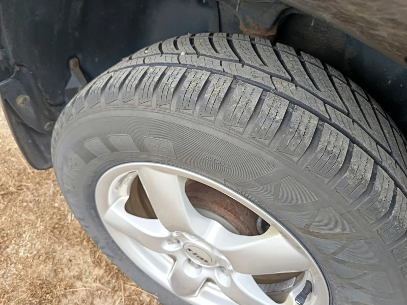 Hyundai Tucson, снимка 12 - Автомобили и джипове - 52921432