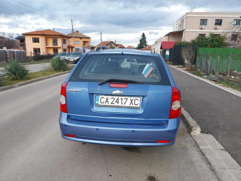 Chevrolet Nubira 1.6 газ клима , снимка 5 - Автомобили и джипове - 53470523
