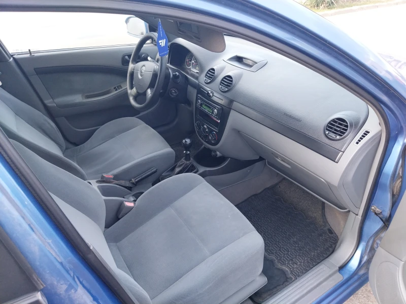 Chevrolet Nubira 1.6 газ клима , снимка 4 - Автомобили и джипове - 53470523